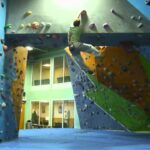 Man on indoor climbing wall