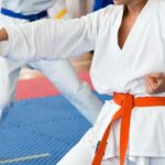 child practising martial arts