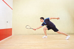 Squash court and player